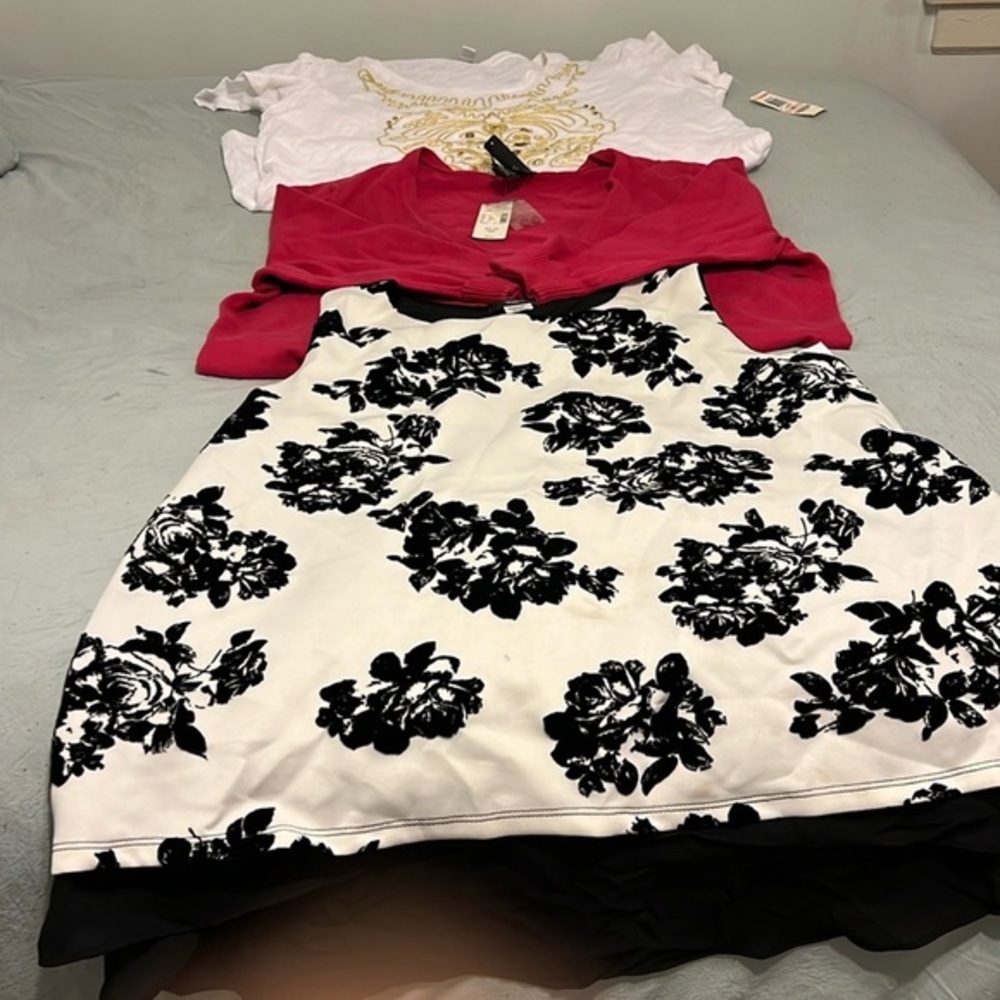 Women’s tops, white tee with design, pink cardigan and blk and white blouse.